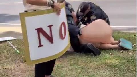3 Jack-Officers Arrest 61 Yr Old Lady in Penis Costume w/a sign that said "No Dick-Tator" @ No Kings