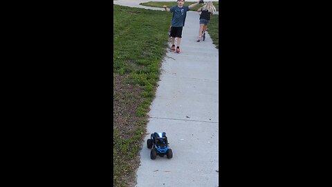 BradKuz76 Tomrik and Harper playing by the pool