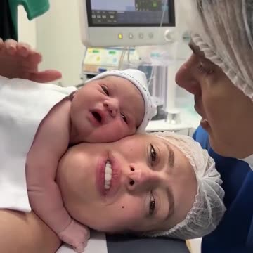 A Miracle of Love: The Newborn Baby Video That Smiles at His Father's Voice Moves the World