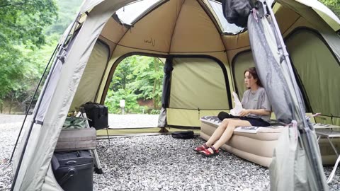 Outdoor camping, immersive viewing without commentary, and tedious tent setting up.