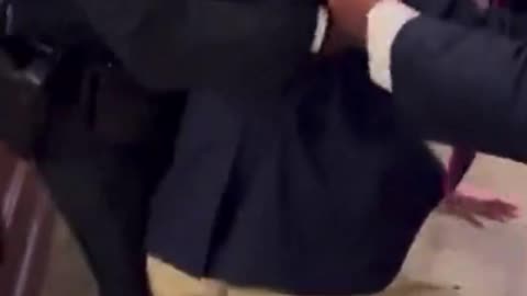 Mitch McConnell trips and falls to his knees.