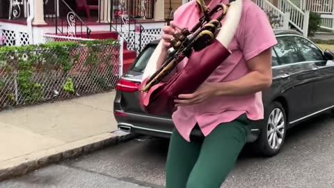 Smooth Recovery After Unicycling Tuba Player Stumbles
