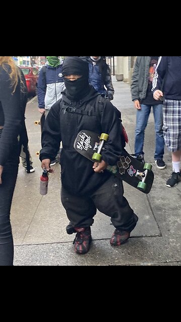 Midget black antifa threatens elderly White