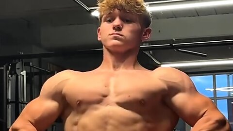 17 years old teen bodybuilder flexing muscles