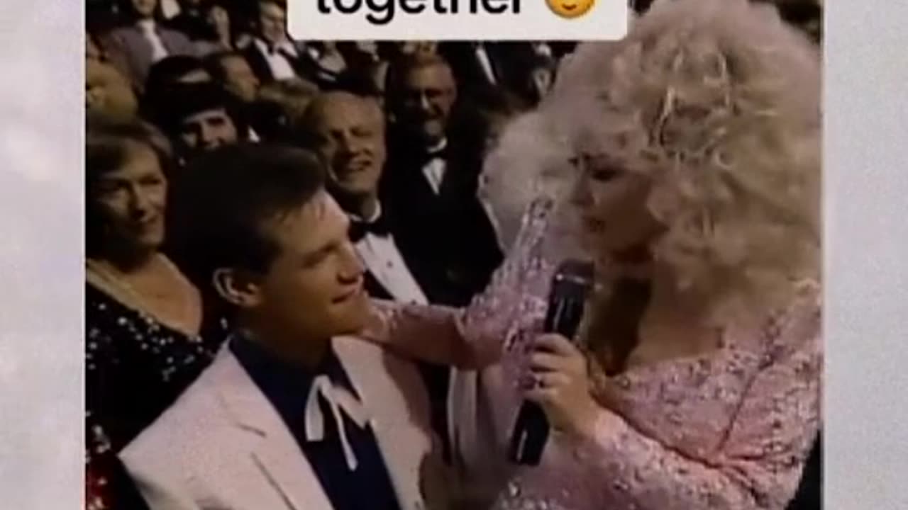 Dolly & Randy Travis were flirting together