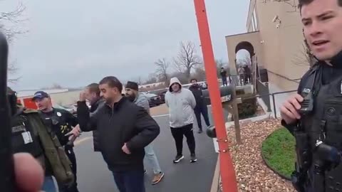 Muslims Attempt to Force a Christian Preaching on a Public Sidewalk in St Louis to Stop Preaching