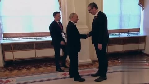 President Vuc'ic' of Serbia meets President Putin of Russia