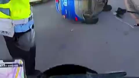 Shocking: Biker Helps Police Flip Over Car to Clear the Road #cops #police #shor