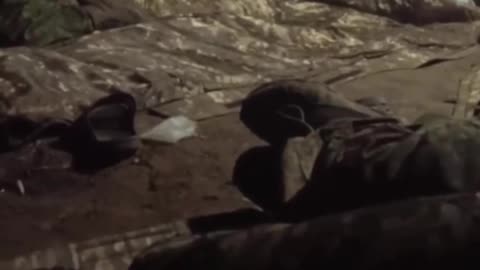 Russian Soldiers Inside of a Dugout Under Intense Bombardment