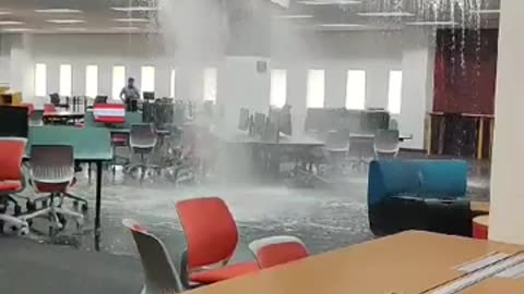 Water Pours in from Library Ceiling