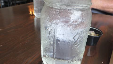 Interesting drinking apparatus at restaurant makes a good noise with ice cubes!