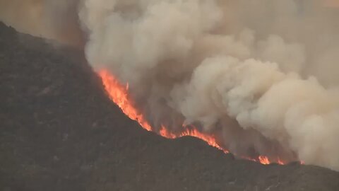 Massive wildfire in Central California threatens homes, injures 3 people