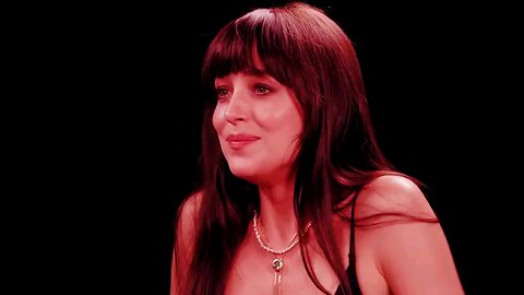 Dakota Johnson is not okay while eating spicy wings