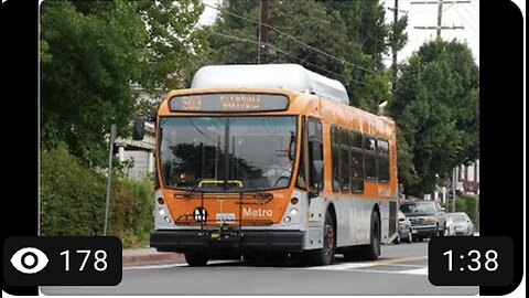 LA Metro Bus Metro NABI 31LFW bus on West 23rd Street in University Park, Los Angeles.