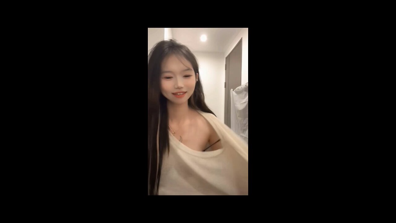 girl takes off her bra