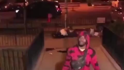Negro Thug knocks out a woman with a skateboard after he asks for her phone number and she declined