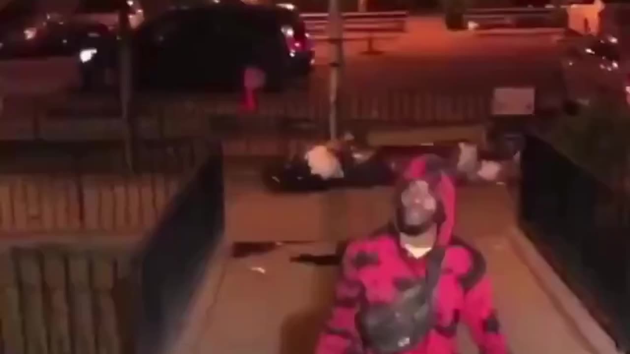 Negro Thug knocks out a woman with a skateboard after he asks for her phone number and she declined