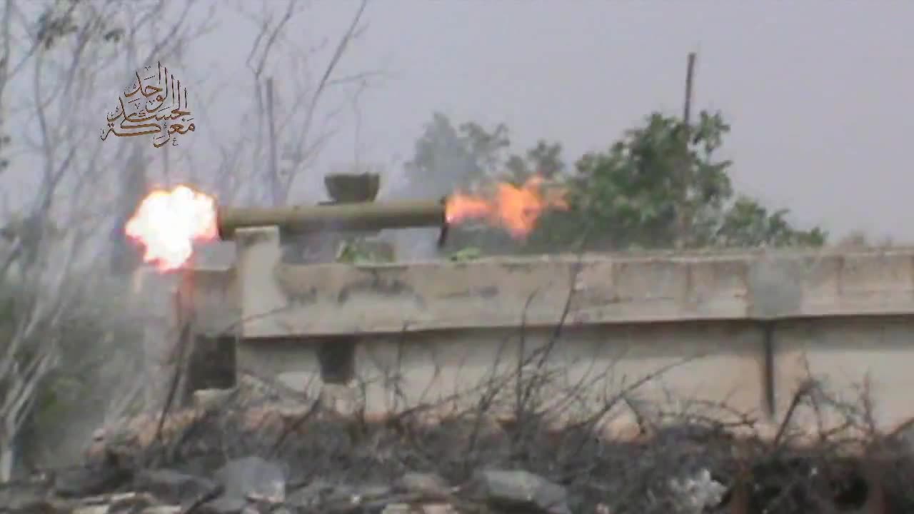 Syrian War Qasr al Mukharram, NE. Hama, Konkurs, vs. T-62, hit (Ahrar al Sham) 2013.05.10