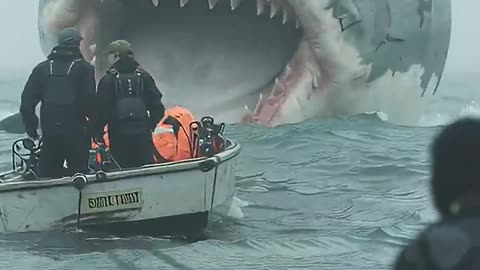 giant shark attacking a boat
