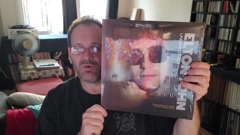 Update Elton John Uncovered Arrived ITS MARBLE ORANGE