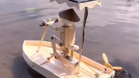 From Wood to Water: Crafting a Miniature Boat with a Pedal-Powered Man!