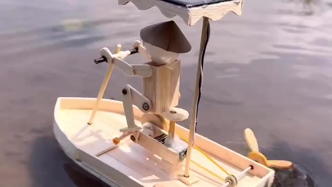 From Wood to Water: Crafting a Miniature Boat with a Pedal-Powered Man!