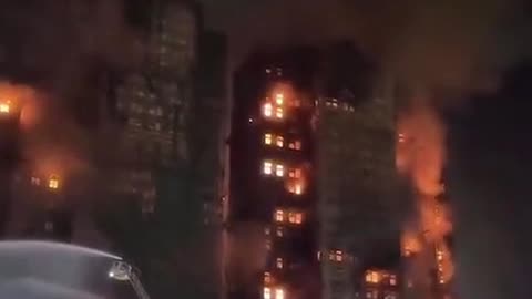 Firestorm in Hong Kong: High-Rise Engulfed in Explosive Flames