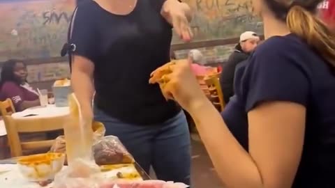 A video has surfaced showing a tense moment inside a restaurant