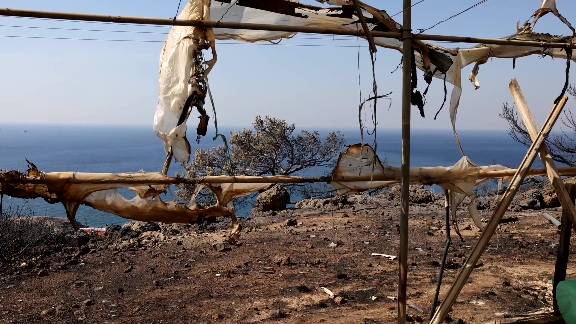 Crete wildfire leaves behind charred ground and damaged farms