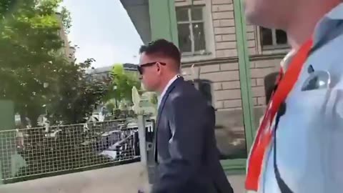 Palantir CEO Peter Thiel interrogated by a citizen in the street