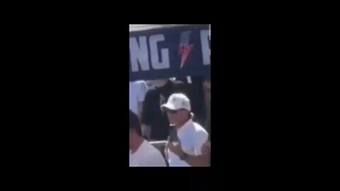 Is This Charlie’s Security Detail Standing Behind Him Making These Signs & Gestures?