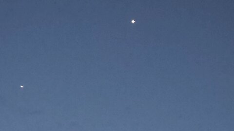 Two spacecraft f UFOs having a fire fight