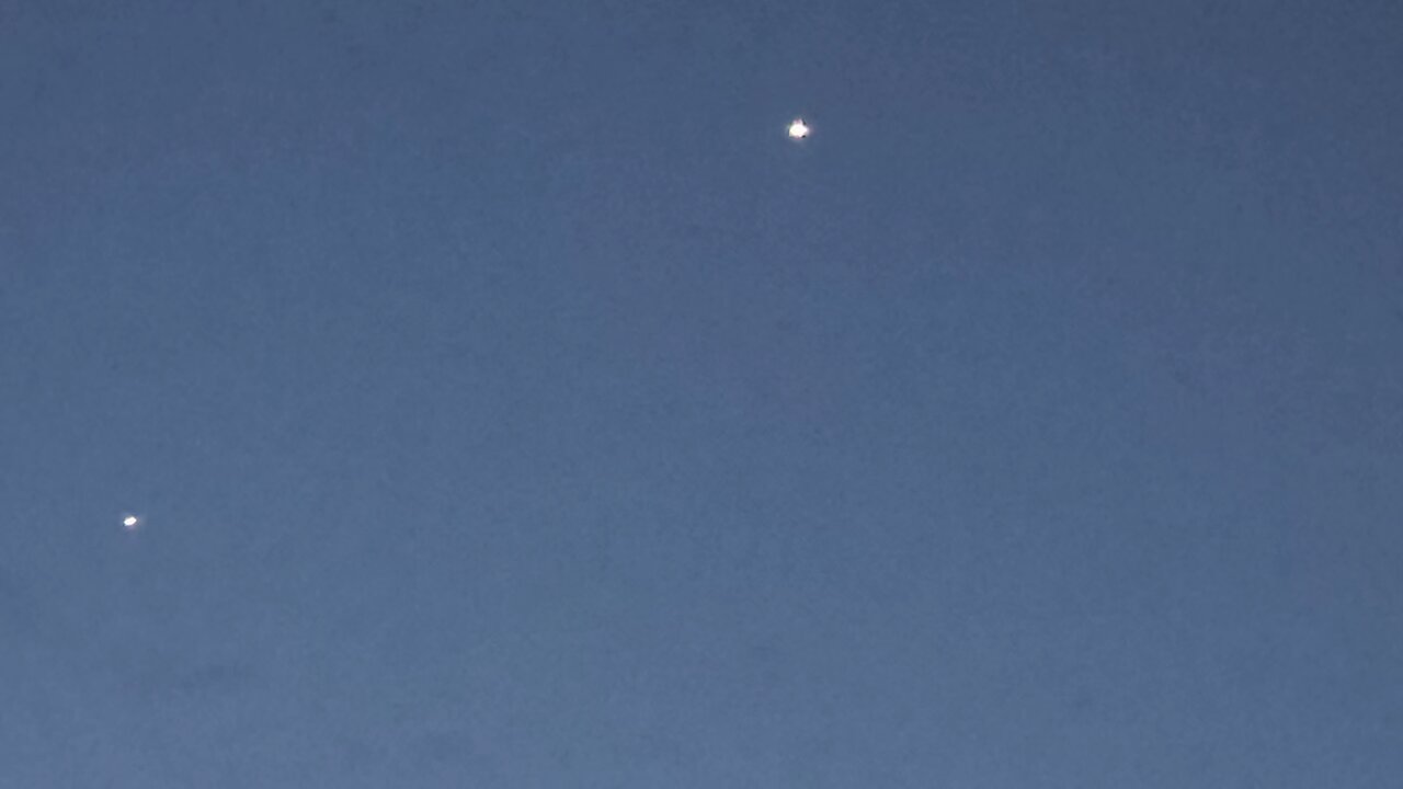 Two spacecraft f UFOs having a fire fight