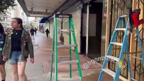 Why are LA stores boarding up for a peaceful protest?