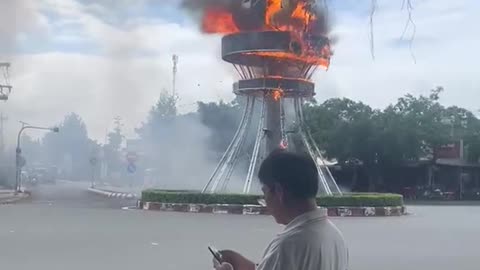 Streetlight Box Fire at Intersection: Suspected Electrical Short Circuit, $10,000 Damage
