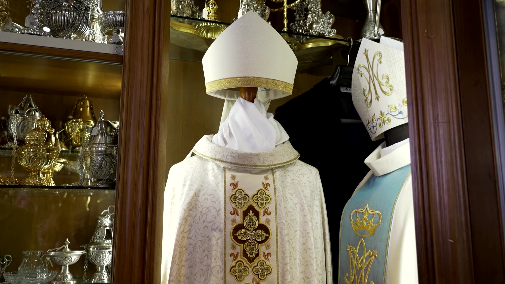 Small, medium or large? Papal tailor keeps his options open