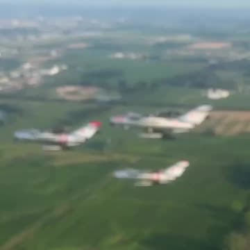 Group flight of MiG-17s at the Oshkosh airshow, USA