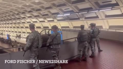 Armed National Guard troops patrol Metro Station in Washington DC to keep diversity in check
