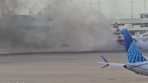 BREAKING: An American Airlines plane just caught fire at Denver International Airport.