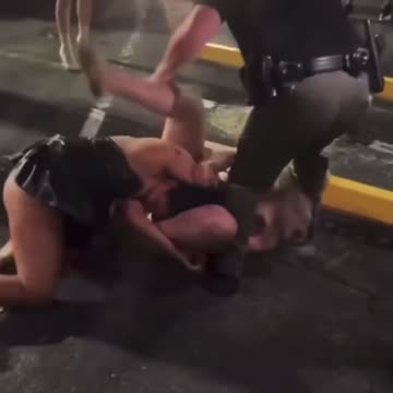 Multiple women simultaneously fighting, one girls pad falls out mid punch