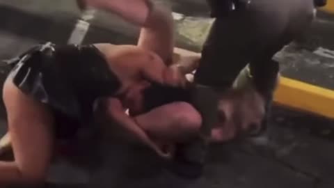 Multiple women simultaneously fighting, one girls pad falls out mid punch