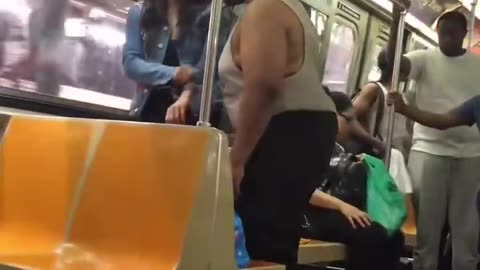 Black man attacks woman in public transportation