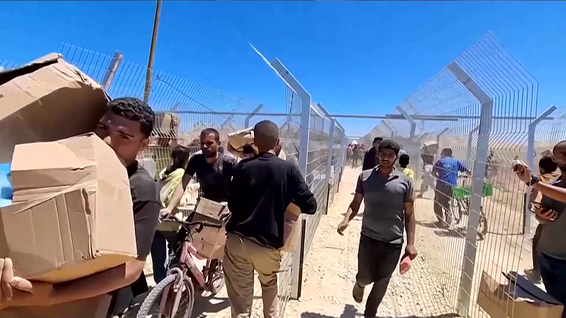 Israeli fire kills and wounds dozens near Gaza food distribution site