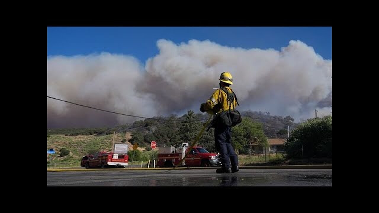 Live aerials of Perris, California, over Juniper Fire