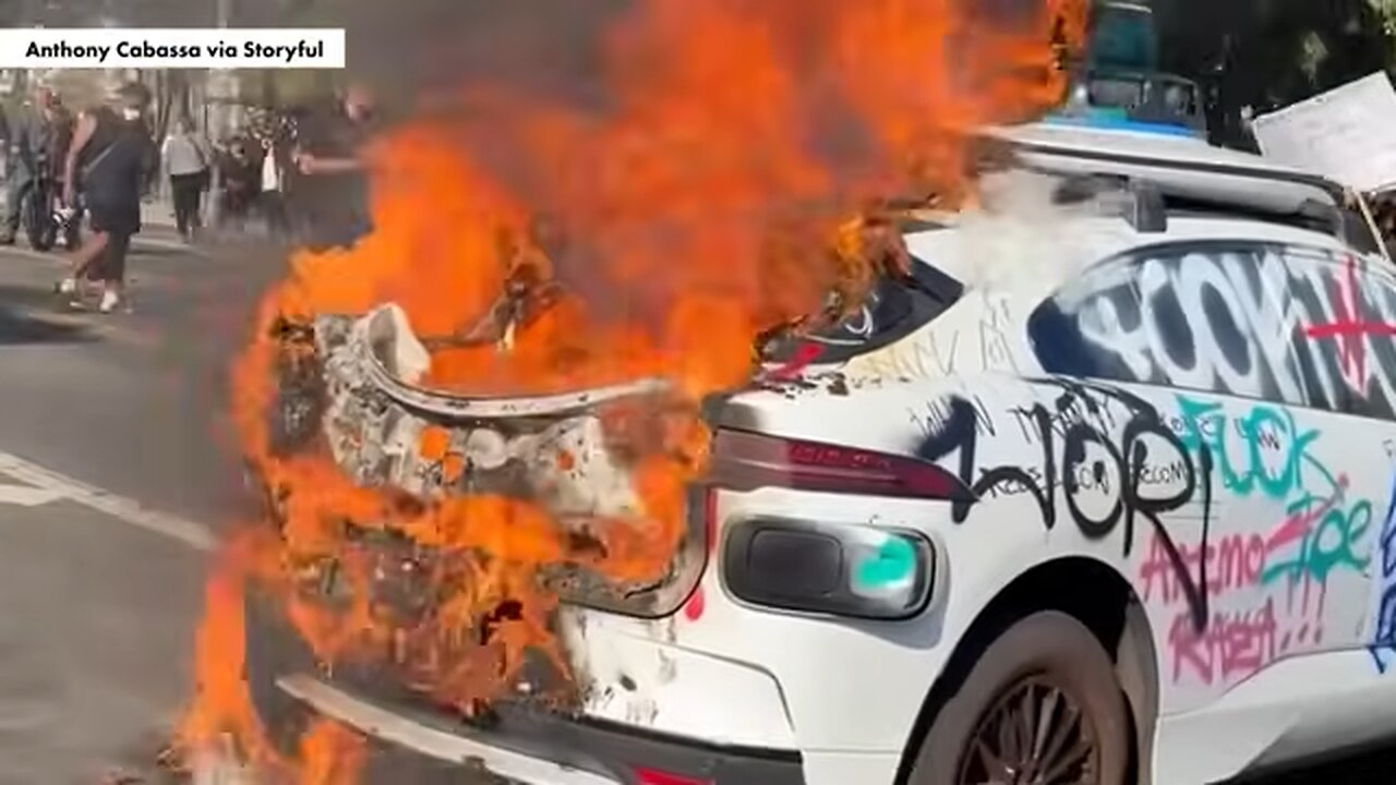 Self-driving cars lit on fire by anti-ICE vandals in Los Angeles