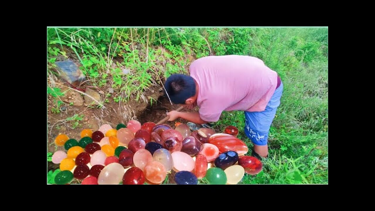 The gems are hidden in a layer of gravel, covered by vegetation. Crystal, agate, gem, agate, crystal