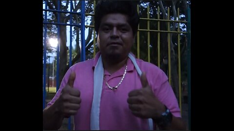 Luodong Massages Mexican Man In Pink Shirt On The Park Bench