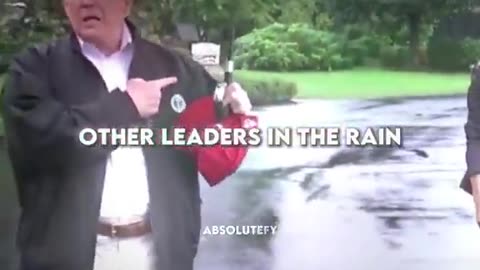 Other leaders in the rain. Putin 💪🏼 stands firm