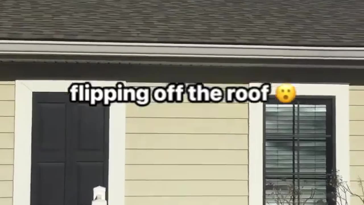 A gymnastics tumbling routine from a roof top to a yard