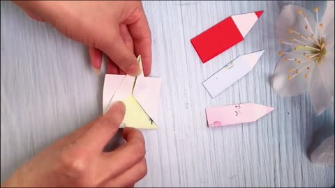 origami making paper art pencil and triangle
